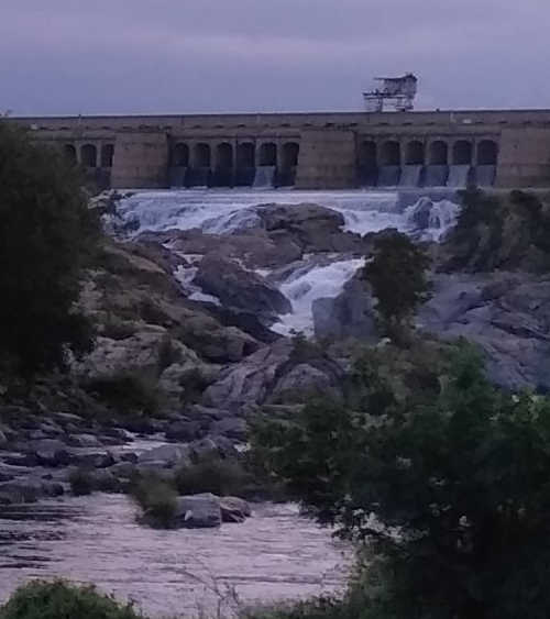 water flowing from KRS dam gates